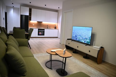 TV and multimedia, Kitchen or kitchenette, Living room, Seating area, Evening entertainment