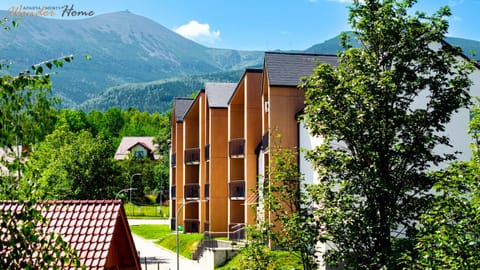 Property building, Nearby landmark, Day, Natural landscape, Mountain view