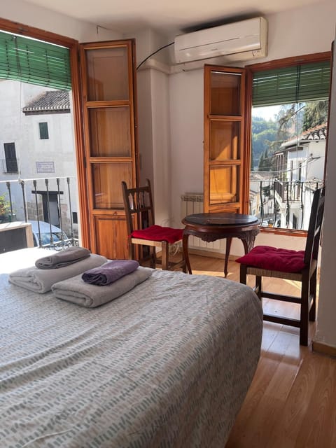 Bed, Balcony/Terrace, Photo of the whole room, Seating area, Bedroom, air conditioner