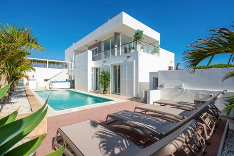 Property building, Natural landscape, Swimming pool, sunbed