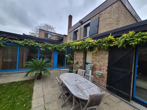 Property building, Patio, Dining area, Garden view
