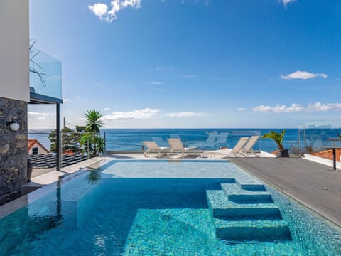 Patio, Day, Natural landscape, Pool view, Sea view, Swimming pool, sunbed
