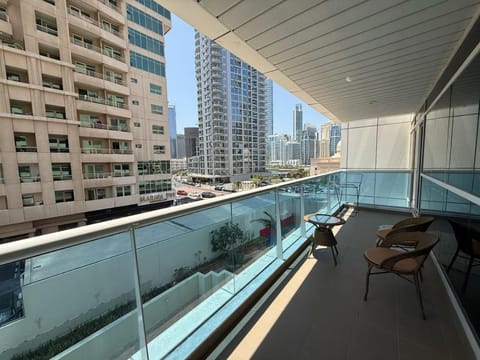 View (from property/room), Balcony/Terrace, Seating area, City view