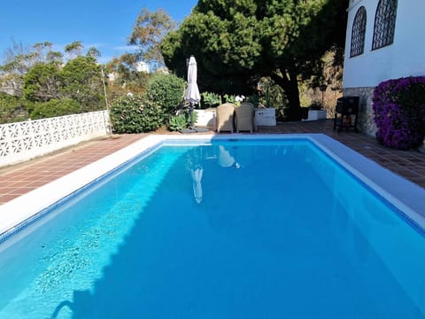 Property building, Living room, Swimming pool