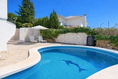 Property building, Living room, Swimming pool