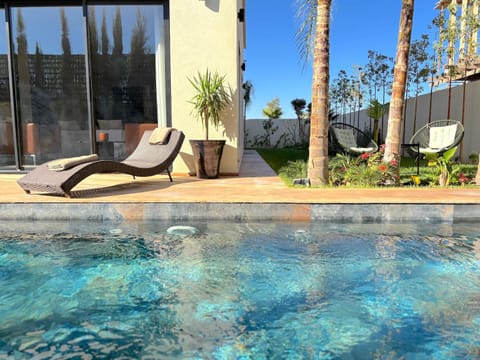 Patio, Day, Pool view, Swimming pool, sunbed