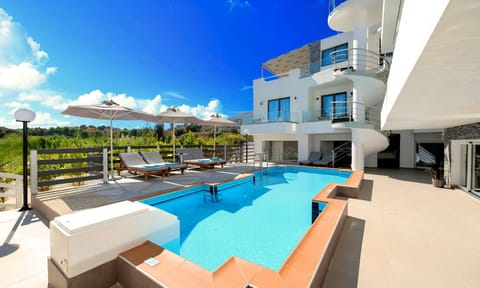 Property building, Patio, Day, View (from property/room), Balcony/Terrace, Pool view, Swimming pool, sunbed