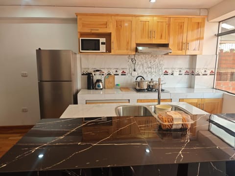 Kitchen or kitchenette, minibar, stove