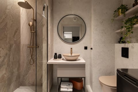 Shower, Bathroom, hair dryier, towels, laundry