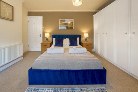 Bed, Photo of the whole room, Bedroom, cot, flat iron, furniture, hair dryier, heating, towels, wardrobe