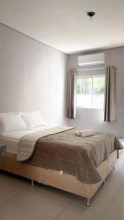 Bed, Photo of the whole room, Bedroom, towels, air conditioner