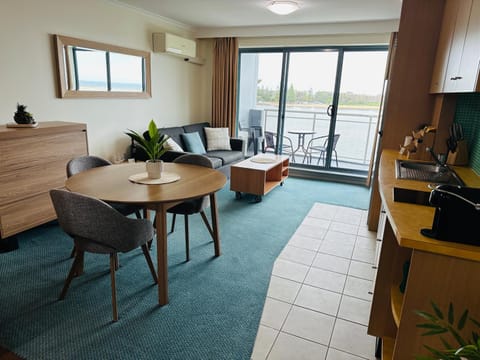 View (from property/room), Balcony/Terrace, Kitchen or kitchenette, Living room, Seating area, Dining area