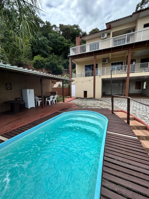 Property building, Patio, Pool view, Swimming pool