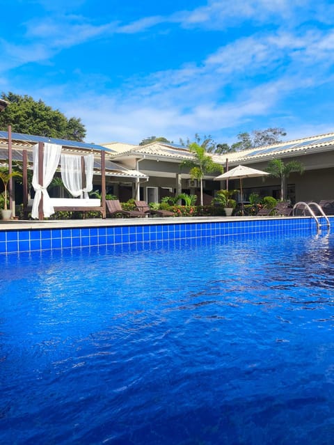 Property building, Pool view, Swimming pool, sunbed