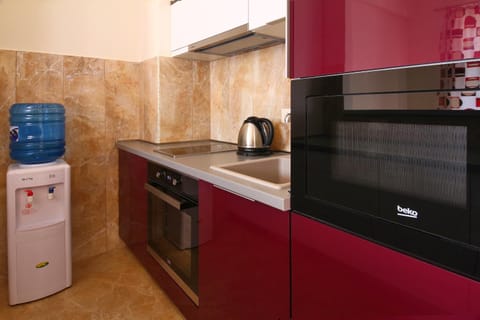 Kitchen or kitchenette, oven, stove