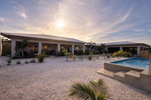 Property building, Day, Natural landscape, Pool view, Swimming pool, sunbed