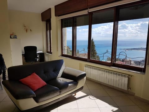 Natural landscape, Living room, Seating area, Mountain view, Sea view