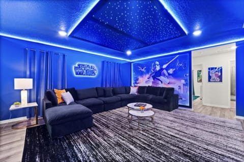 Property building, Restaurant/places to eat, TV and multimedia, Living room, Seating area, Swimming pool