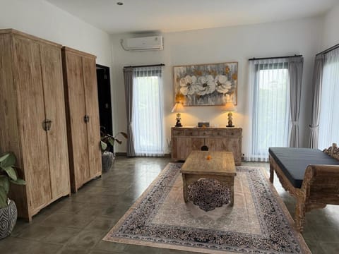 Seating area, wardrobe, air conditioner