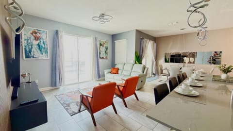 Modern Oasis at Storey Lake w 4BR & Heated Pool House in Kissimmee