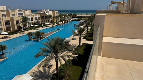 Property building, Natural landscape, Bird's eye view, Pool view, Sea view, Swimming pool, sunbed