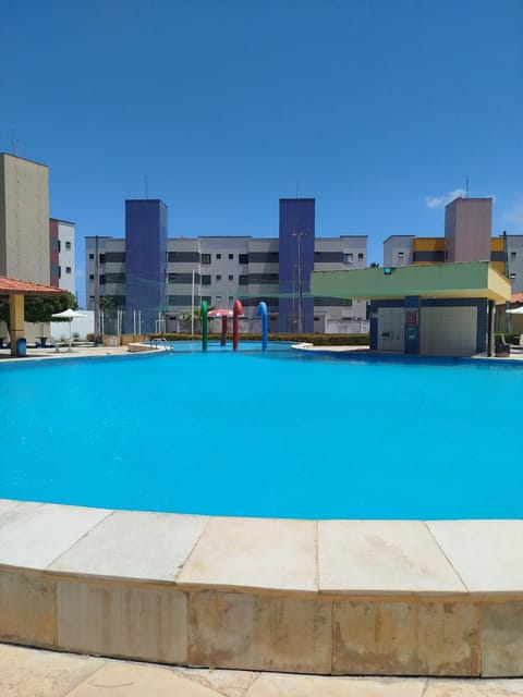 Property building, Day, Pool view, Swimming pool, sunbed