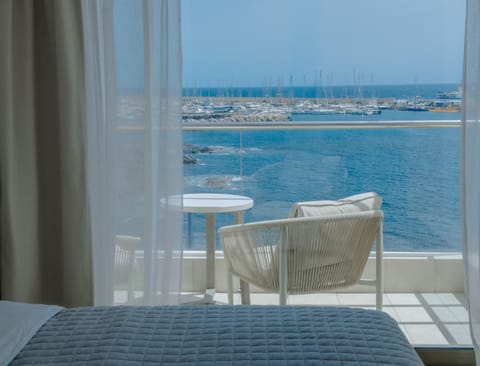 Bed, Day, View (from property/room), Balcony/Terrace, Seating area, Sea view