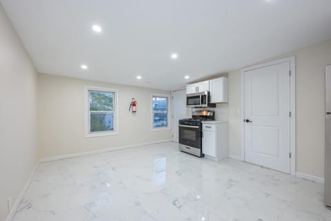 Kitchen or kitchenette, oven, stove