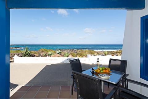 Patio, Day, Natural landscape, View (from property/room), Balcony/Terrace, Living room, Seating area, Dining area, Sea view