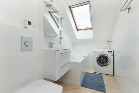Bathroom, towels, washing machine