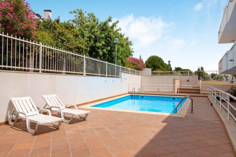 Property building, Living room, Swimming pool