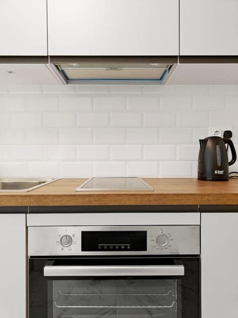 Kitchen or kitchenette, oven