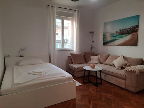 Bed, Living room, Seating area