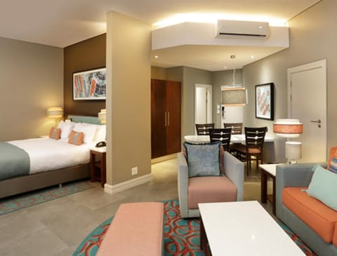 Bed, Living room, Seating area, Bedroom, air conditioner