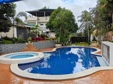 Property building, Pool view, Swimming pool, sunbed