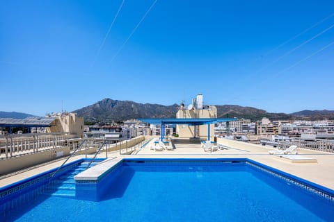 Property building, Living room, Swimming pool