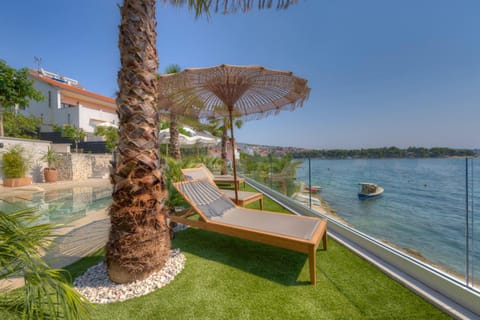 Palmezzo Beachfront Suites with Heated Pool Apartment in Trogir