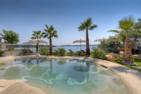 Palmezzo Beachfront Suites with Heated Pool Apartment in Trogir