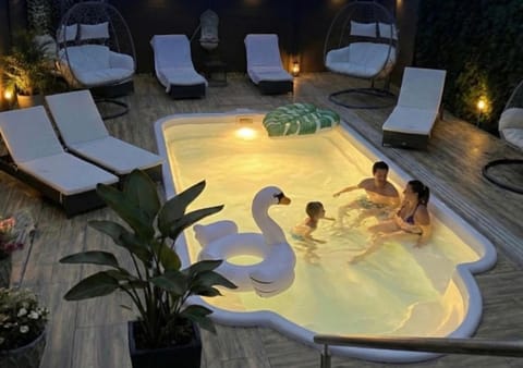 Night, People, Pool view, Swimming pool, group of guests, sunbed