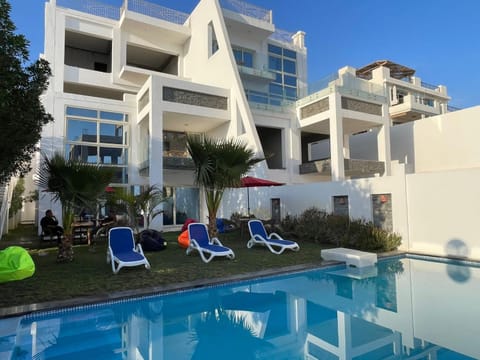 Property building, Patio, Day, Garden, Balcony/Terrace, Garden view, Pool view, Swimming pool, sunbed