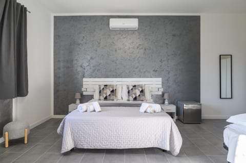 Bed, Photo of the whole room, Bedroom, towels, air conditioner