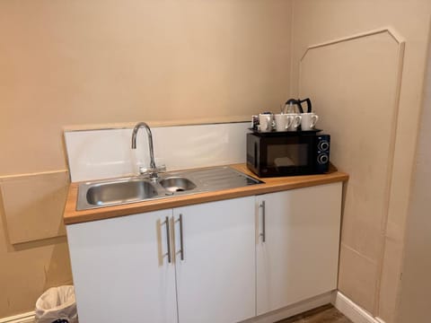 Kitchen or kitchenette, microwave