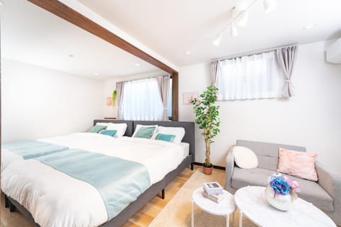 Bed, Living room, Seating area, Bedroom