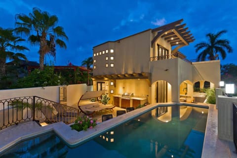 Property building, Patio, Night, BBQ facilities, BBQ facilities, Swimming pool, Swimming pool, sunbed