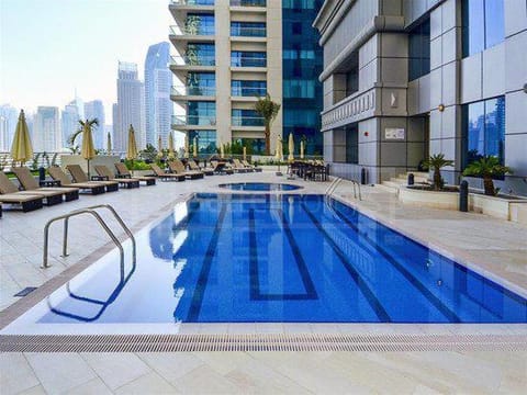 Property building, Day, Pool view, Swimming pool, sunbed