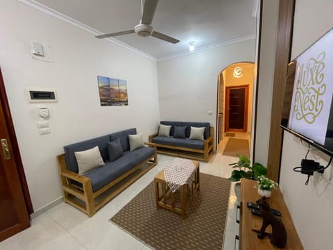 TV and multimedia, Living room, Seating area, fireplace, air conditioner