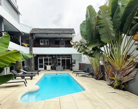 Property building, Pool view, Swimming pool, sunbed