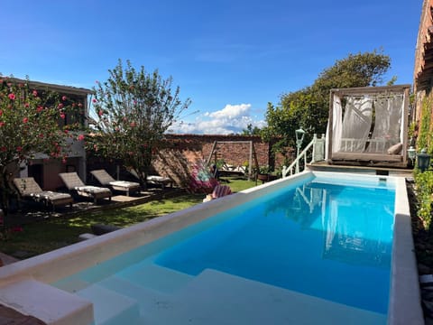 Property building, Pool view, Swimming pool, sunbed