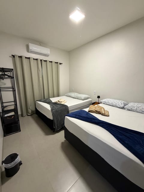 Bed, Photo of the whole room, Bedroom, towels, air conditioner