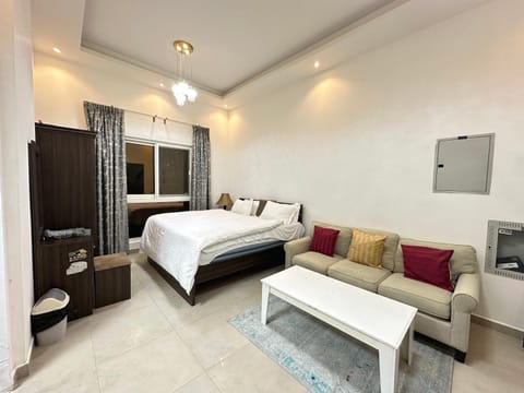 Bed, Living room, Seating area